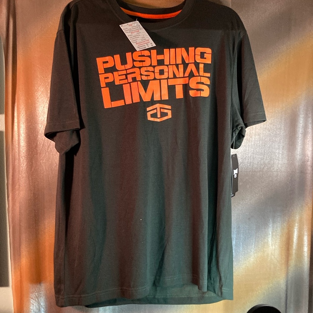 Dark olive green Tap out XL t-shirt with orange writing NWT. Box B